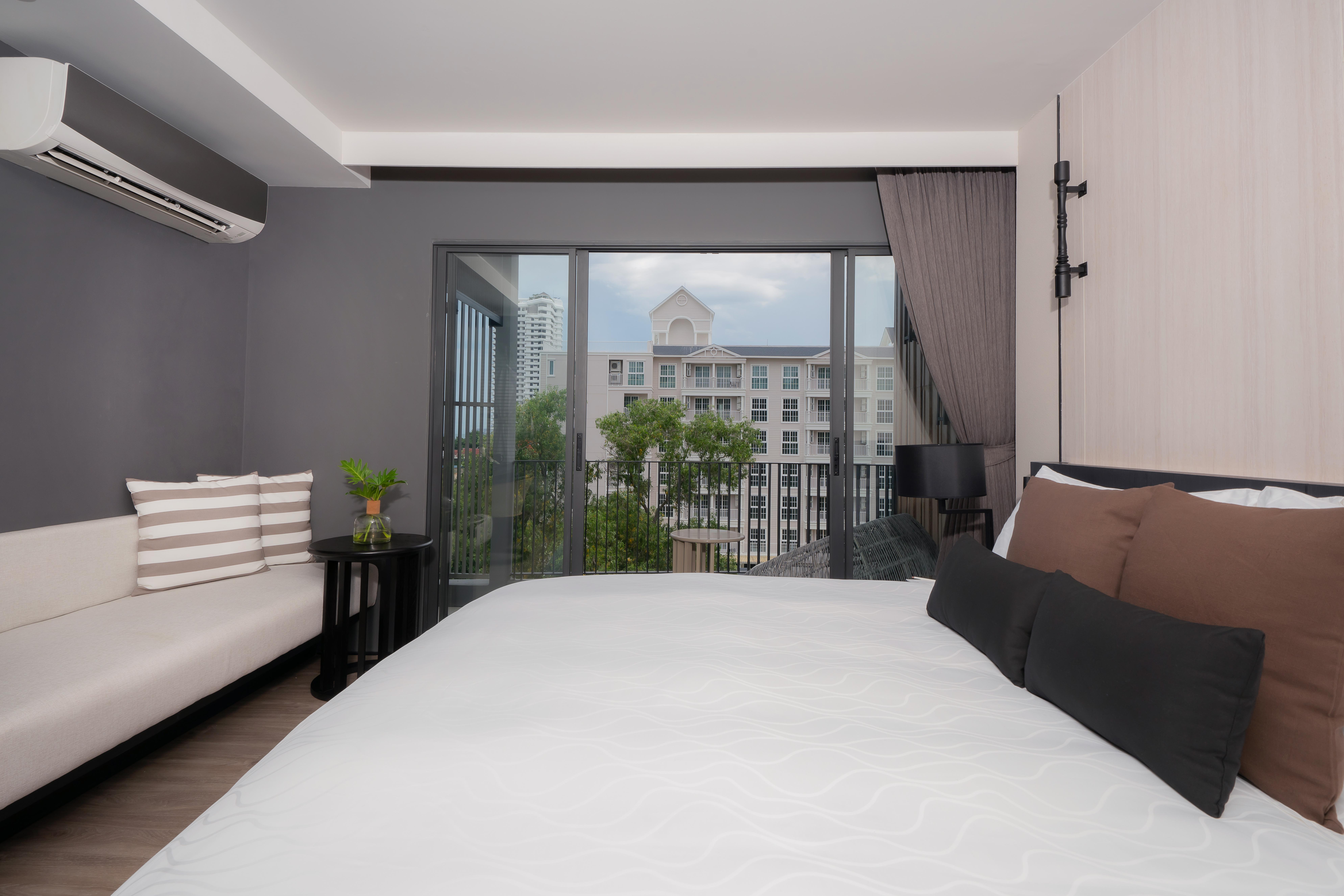 Bayphere Hotel Pattaya Jc Na Chom Thian Εξωτερικό φωτογραφία A bedroom at the hotel